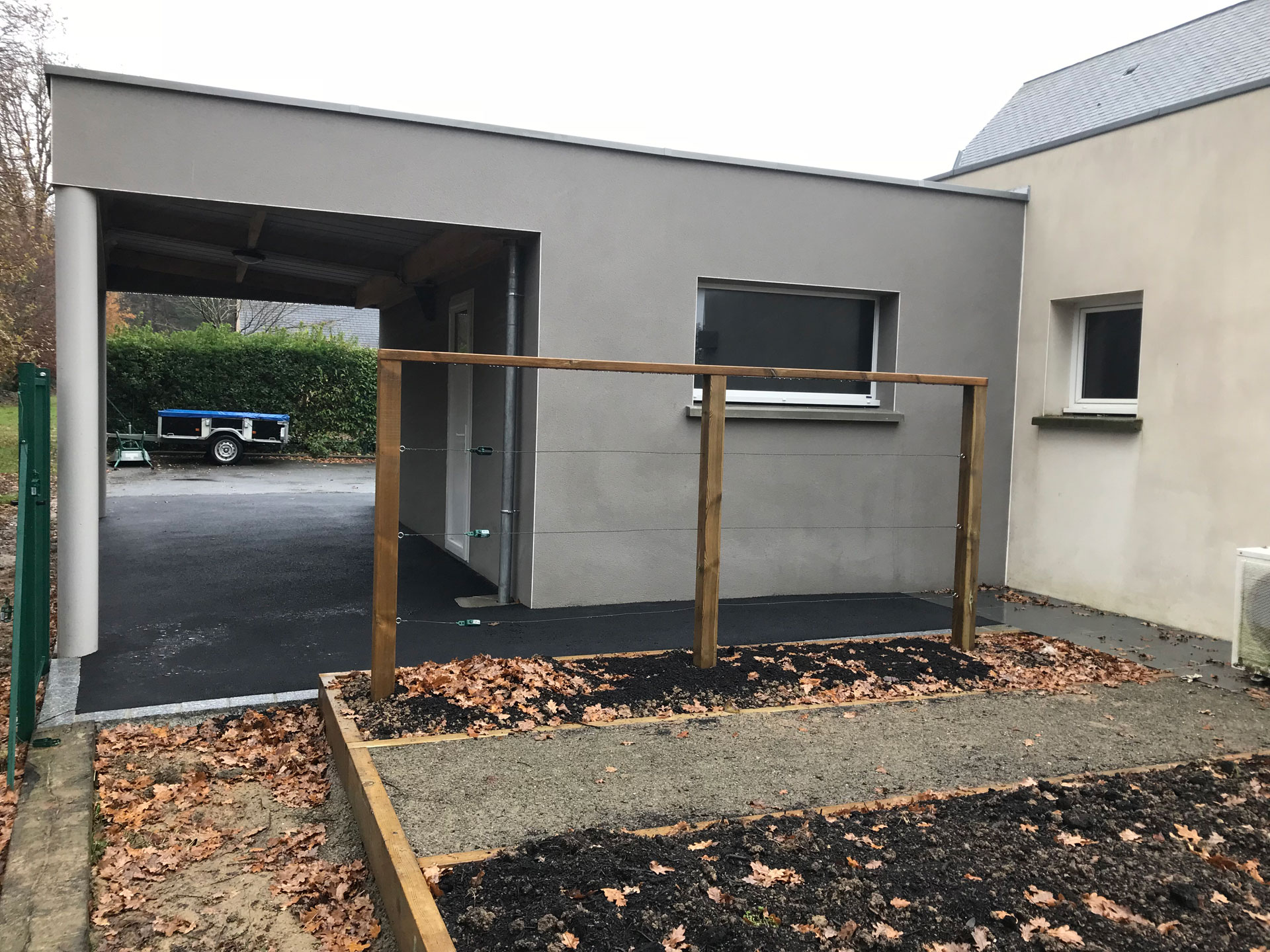 Extension de garage avec carport à toit plat (35170)