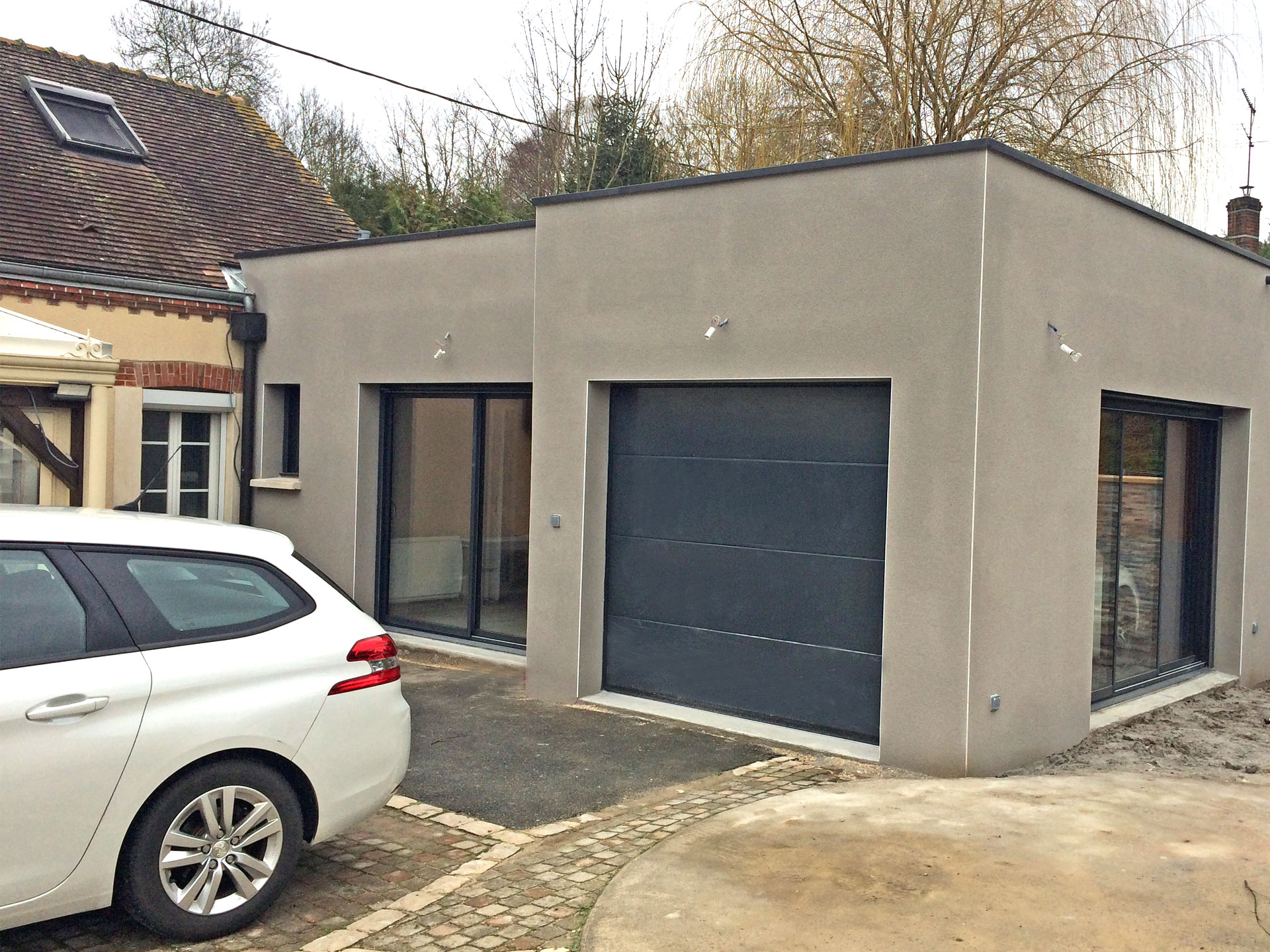 rrealsiation extension maison et garage 45700