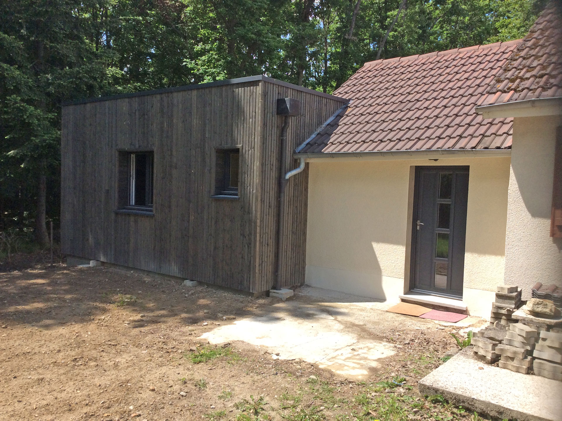 Extension maison bois toit plat Bouzy la forêt 45460