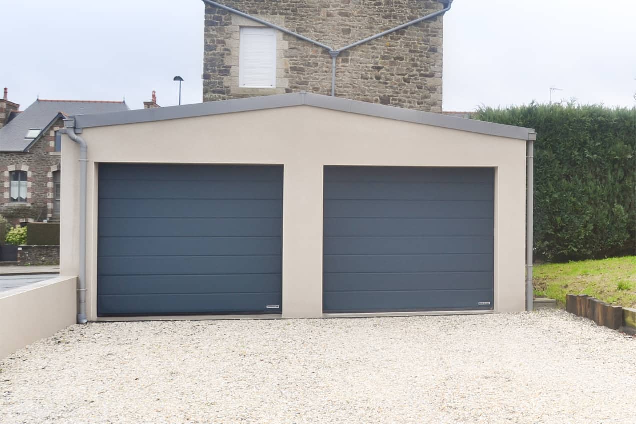 Un garage double fermé par Cybel Extension