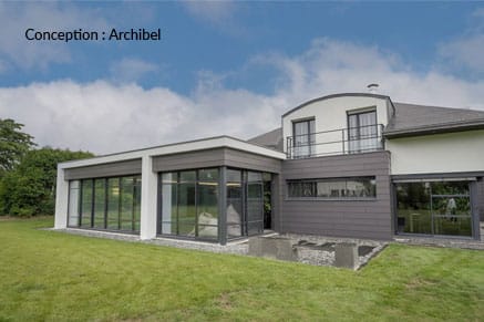 Une extension de maison pour une piscine intérieure