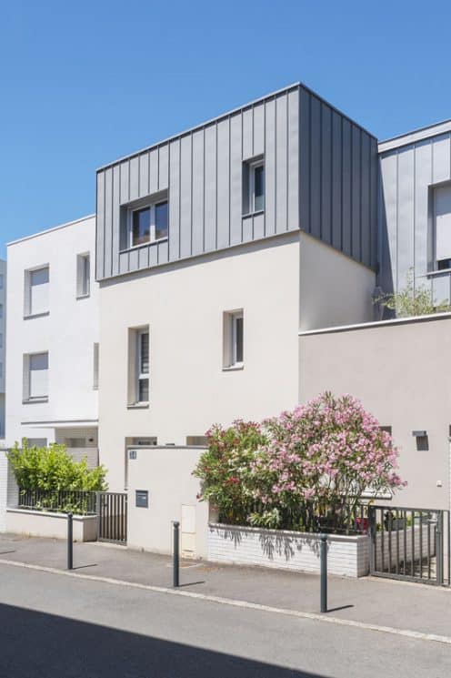 Une surélévation sur une maison de 3 niveaux.